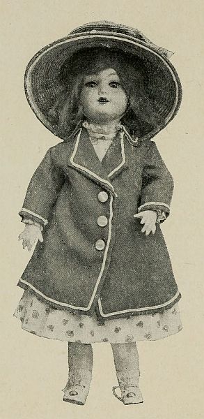 photo dolly all dressed up in coat and hat