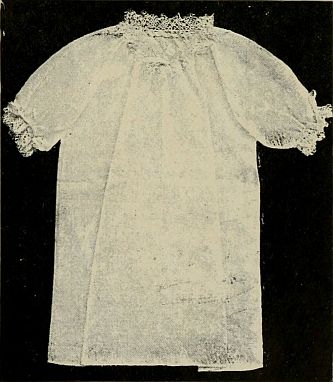 photo of white nightdress with lace trim at collar and sleeves