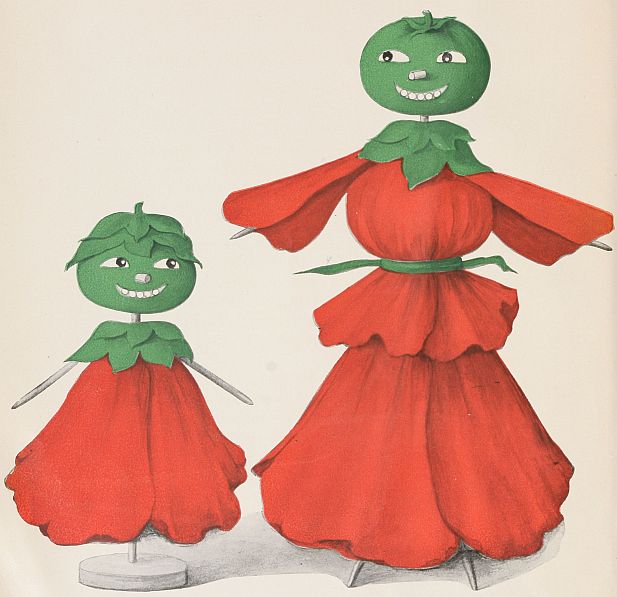 Two toothpick dolls in red dresses with green tomato heads