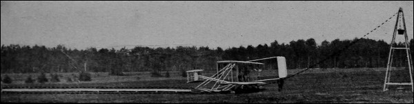 Wright Biplane on Starting Rail, showing Pylon and Weight