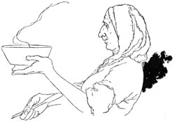 woman holding steaming bowl