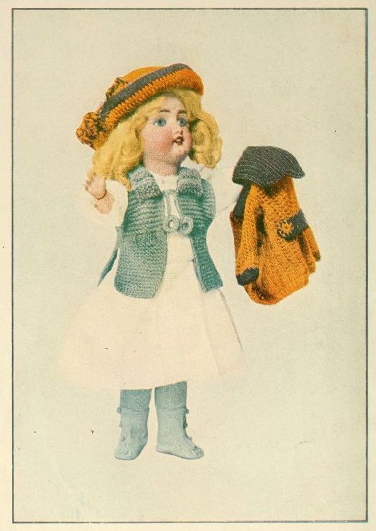 Doll holding a jacket wearing a hat and vest