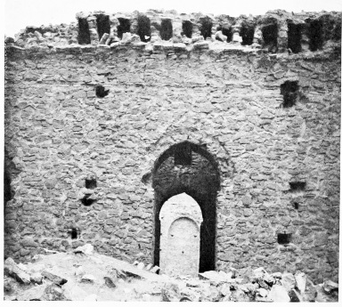 Fig. 103.—UKHEIḌIR, DOOR LEADING FROM V TO W, SEEN FROM
SOUTH.