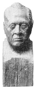 Wooden bust of his father carved by Rizal