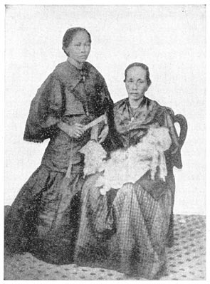 Mrs Rizal and her two daughters.