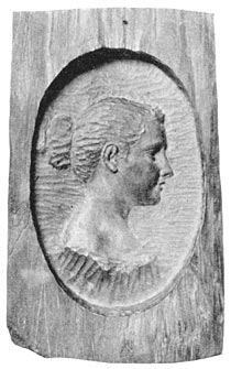 Carving of Josefina Bracken.