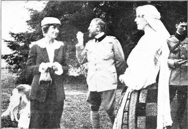 KING FERDINAND TELLS MRS. POWELL HIS OPINION OF THE FASHION IN WHICH THE PEACE CONFERENCE TREATED RUMANIA, WHILE QUEEN MARIE LISTENS APPROVINGLY