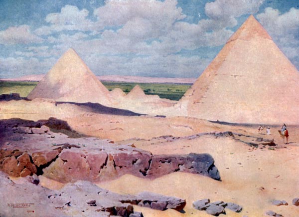 THE PYRAMIDS OF GHIZEH FROM THE DESERT.