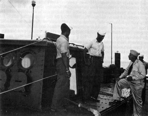 Granger With Crewmen of a Naval Yard Craft
