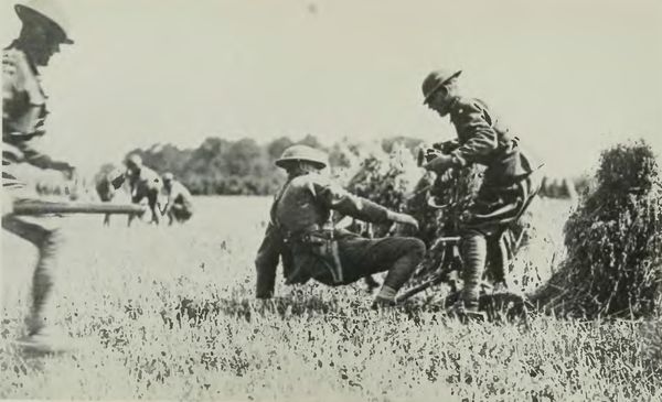 Canadian Machine Gun Section Getting Their Guns Into Action