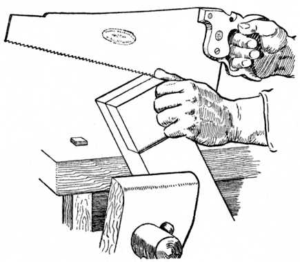Fig. 70.—Sawing the Cheek of a Halving Joint.