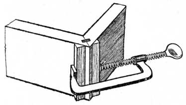 Fig. 116.—Cramping a Tongued and Grooved Mitre.