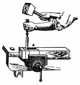 Fig. 183.—Using the Chisel and Mallet for Mortising.