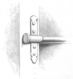 Fig. 76. Iron bar and socket, closed to prevent removal of the bar: Hereford.
