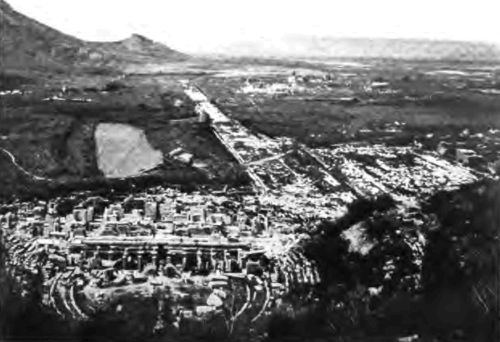 ALL THE PLAINS AND SLOPES OF THE OLD CITY WITH ITS WHITE FRAGMENTS AND POOR RUINED HARBOR LAY AT OUR FEET