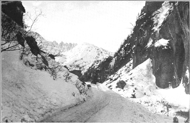 Copyright by E. A. Hegg, Juneau  Courtesy of Webster & Stevens, Seattle  Road through Cut-off Canyon