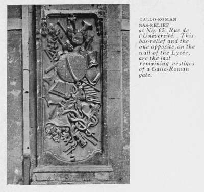 GALLO-ROMAN BAS-RELIEF at No. 65, Rue de l'Université. This bas-relief and the one opposite, on the wall of the Lycée, are the last remaining vestiges of a Gallo-Roman gate.