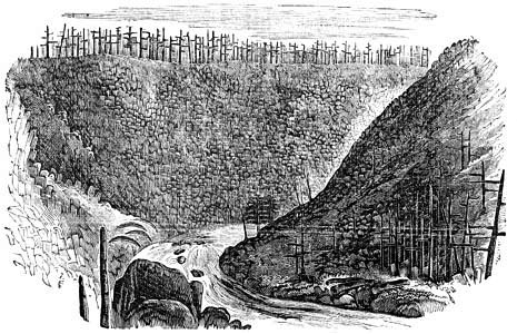 Mountains with a waterfall and river