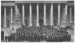 The United States Congress in wartime, including nearly all the members of the House, on the steps of the Capitol (© Harris & Ewing)