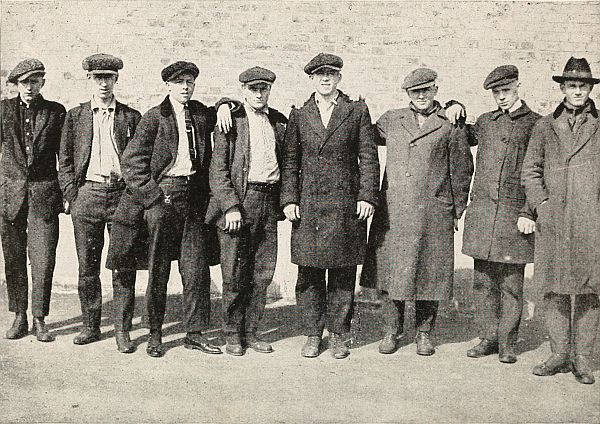 Eight young men in civilian clothes