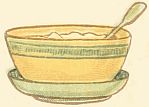 Bowl full of porridge with spoon