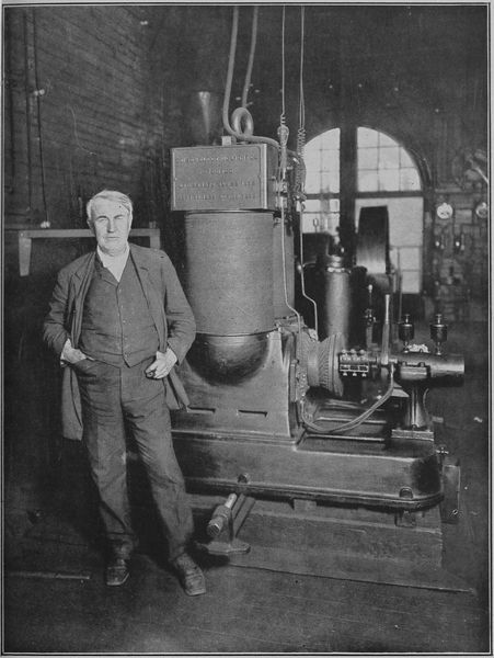 THOMAS A. EDISON AND THE DYNAMO THAT GENERATED THE FIRST COMMERCIAL ELECTRIC LIGHT.