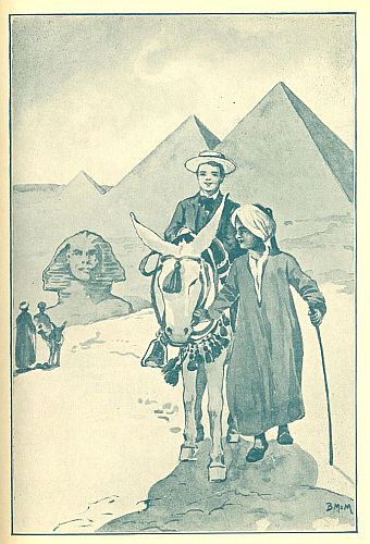 Boy leading boy on donkey; pyramids and sphinx in background