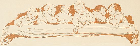line of six babies in bed