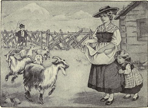 woman and girl watching goats run past