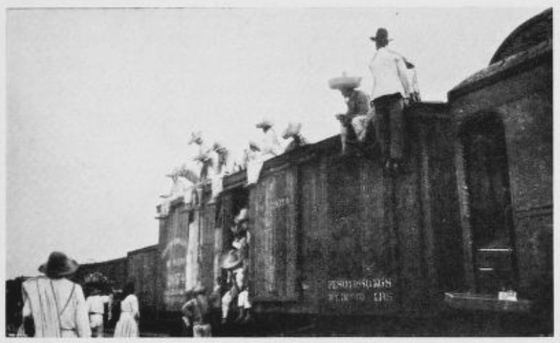 AN ESCORT OF SOLDIERS OCCUPIED A FREIGHT CAR AHEAD AS A PRECAUTION AGAINST BANDITS