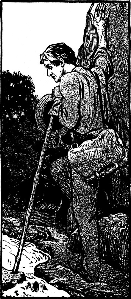 Ein Wanderer mit Wanderstab   an einem Bach