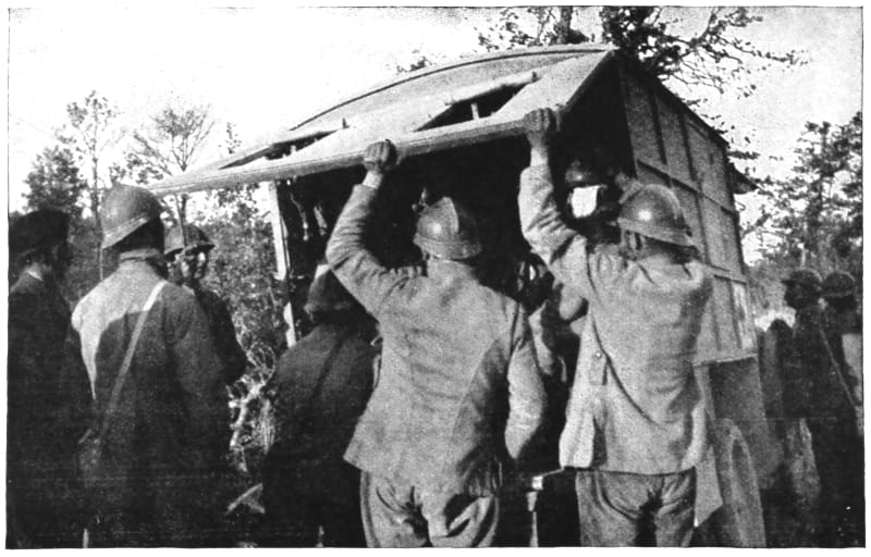Uniformed men near a covered wagon for carrying people.