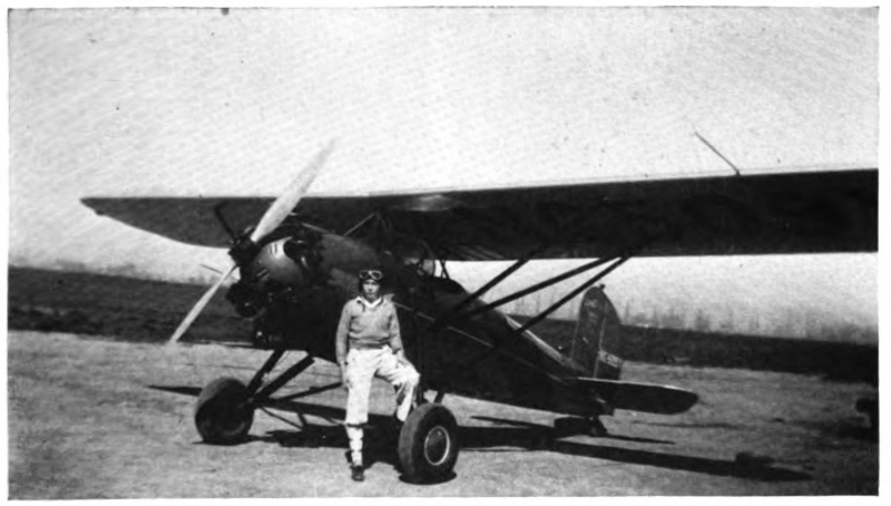 Picture of a man in front of an airplane