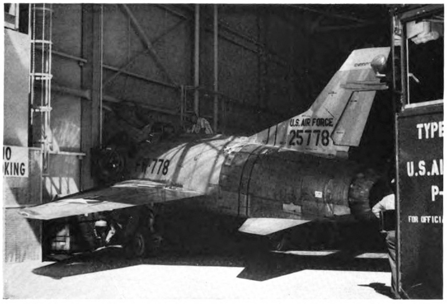 An airplane in a hangar