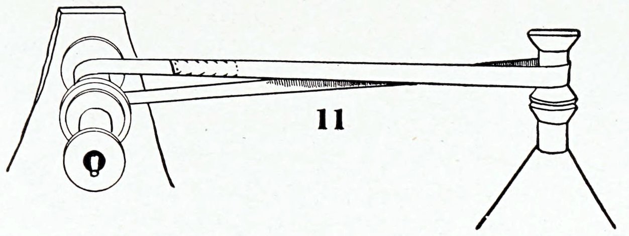 A vintage line illustration demonstrating the assembly diagram for a spinning toy mechanism, labeled with a large number 10. The central diagram shows a vertical stack of components resting on a grainy 'Block of Wood'. A central pin or nail goes down through a large 'Pasteboard Disk', a 'Belt Spool' marked 'Glue', a 'Winding Spool' marked 'Glue Together', a 'Writing Paper Washer', and a 'Writing Paper Cone'. To the right, two isolated parts are shown: a long nail labeled M and a flat washer labeled N.