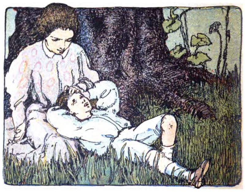 A woman and a young boy are relaxing outside under a big tree. The woman sits on the grass to the left, dressed in a light, long-sleeved dress with a subtle pattern. Her dark hair is pulled back, and she looks down at the boy with a caring expression. The boy lies on his back in the grass with his head resting in her lap. His hands are behind his head as he looks up at her with an open expression. He wears a light shirt, short pants, long socks, and shoes. The woman gently places her hand on his forehead, showing comfort, affection, or reassurance.