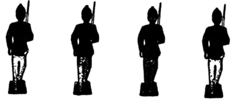 The image shows four black toy soldier silhouettes standing side by side. Each stands on a small square base. They wear pointed military hats, and each holds a rifle upright on their shoulder.