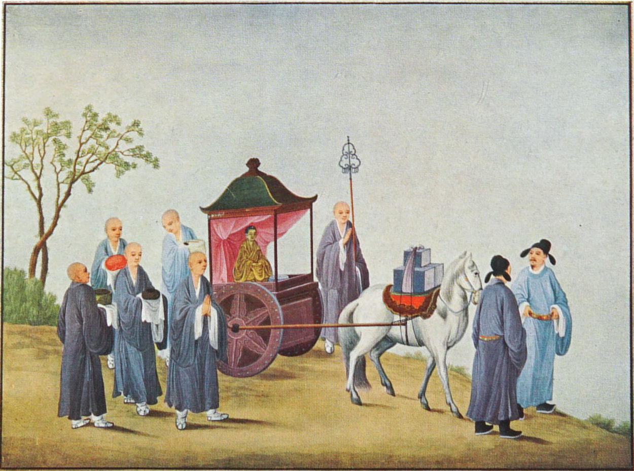 monks walking beside a horse-drawn carriage