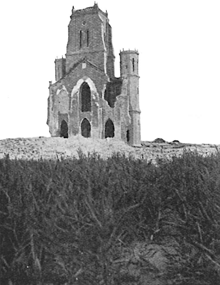 Building in the back with grass in the front