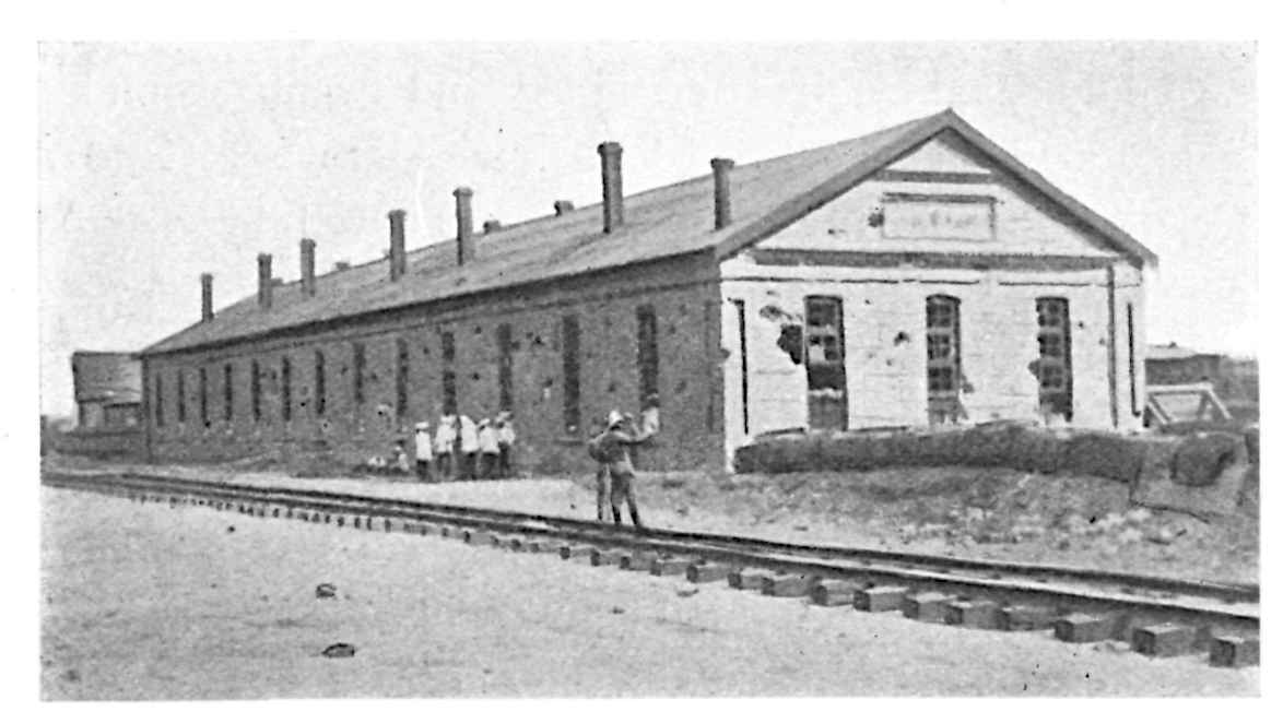 A building next to a railroad