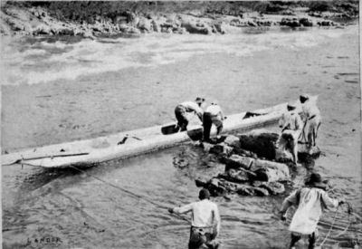 Preparing the Canoe prior to descending a Rapid.