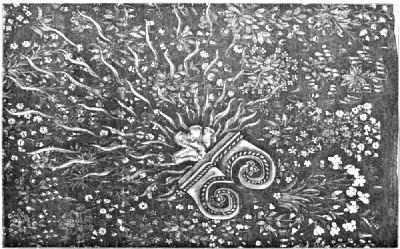 A flat topped, double spiral base object, with radiating 'rays' over a floral background