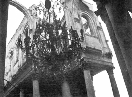The stone roof over this glass chandelier in the Arras cathedral was
destroyed by shells, and the chandelier not touched.