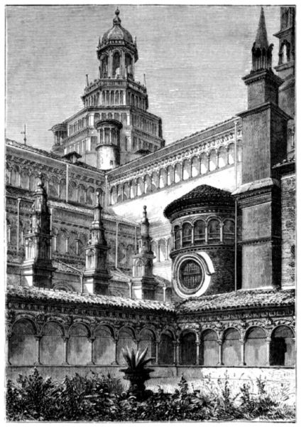 A view from a central courtyard to a high tower