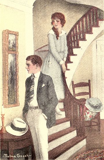 Girl on stairs, man looking at painting