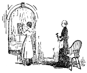 Woman standing before window with maid