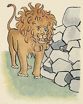 lion talking to rat in rocks