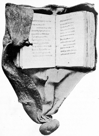Fifteenth-century English manuscript on vellum, “De
Consolatione Philosophiæ.” Rubricated throughout. Its chief interest is
the contemporary binding, consisting of the usual oak boards covered
with pink deerskin, let into another piece of deerskin which completely
surrounds it and terminates in a large knot. A clasp fastens the outer
cover. It was evidently intended to be worn at the girdle. The British
Museum possesses very few bindings of this character and these service
books. Lay books are of even greater rarity.