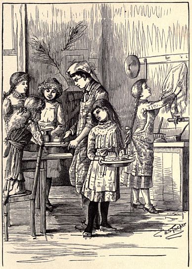 group of girls and woman baking