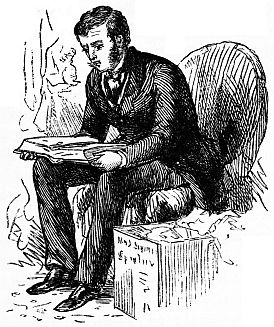 man sitting down reading